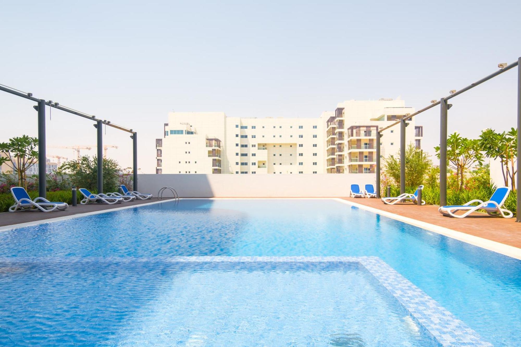Poolside Charm Διαμέρισμα Αμπού Ντάμπι Εξωτερικό φωτογραφία