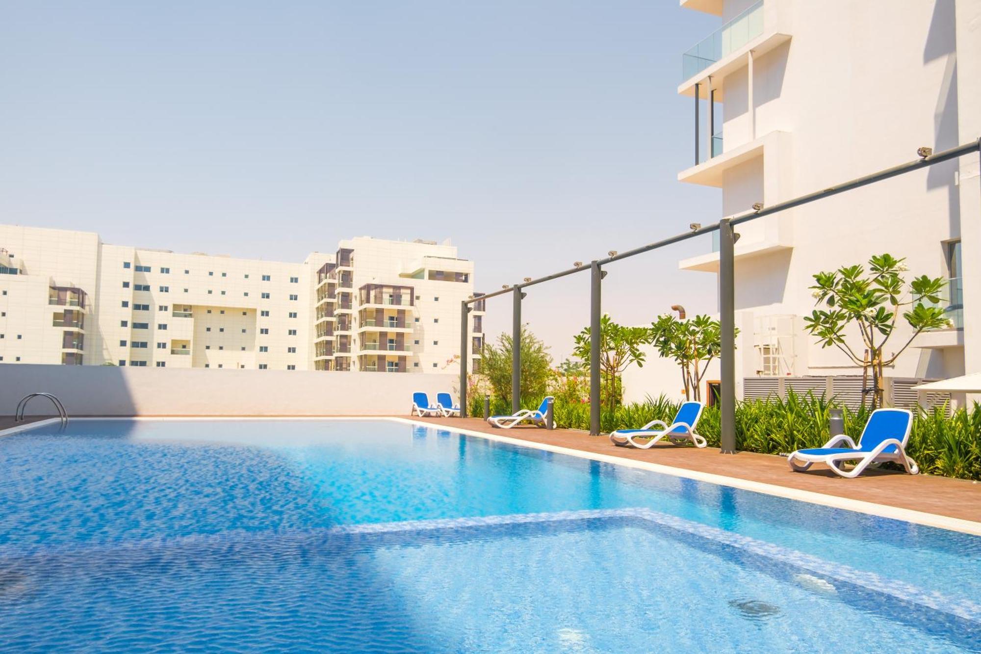 Poolside Charm Διαμέρισμα Αμπού Ντάμπι Εξωτερικό φωτογραφία